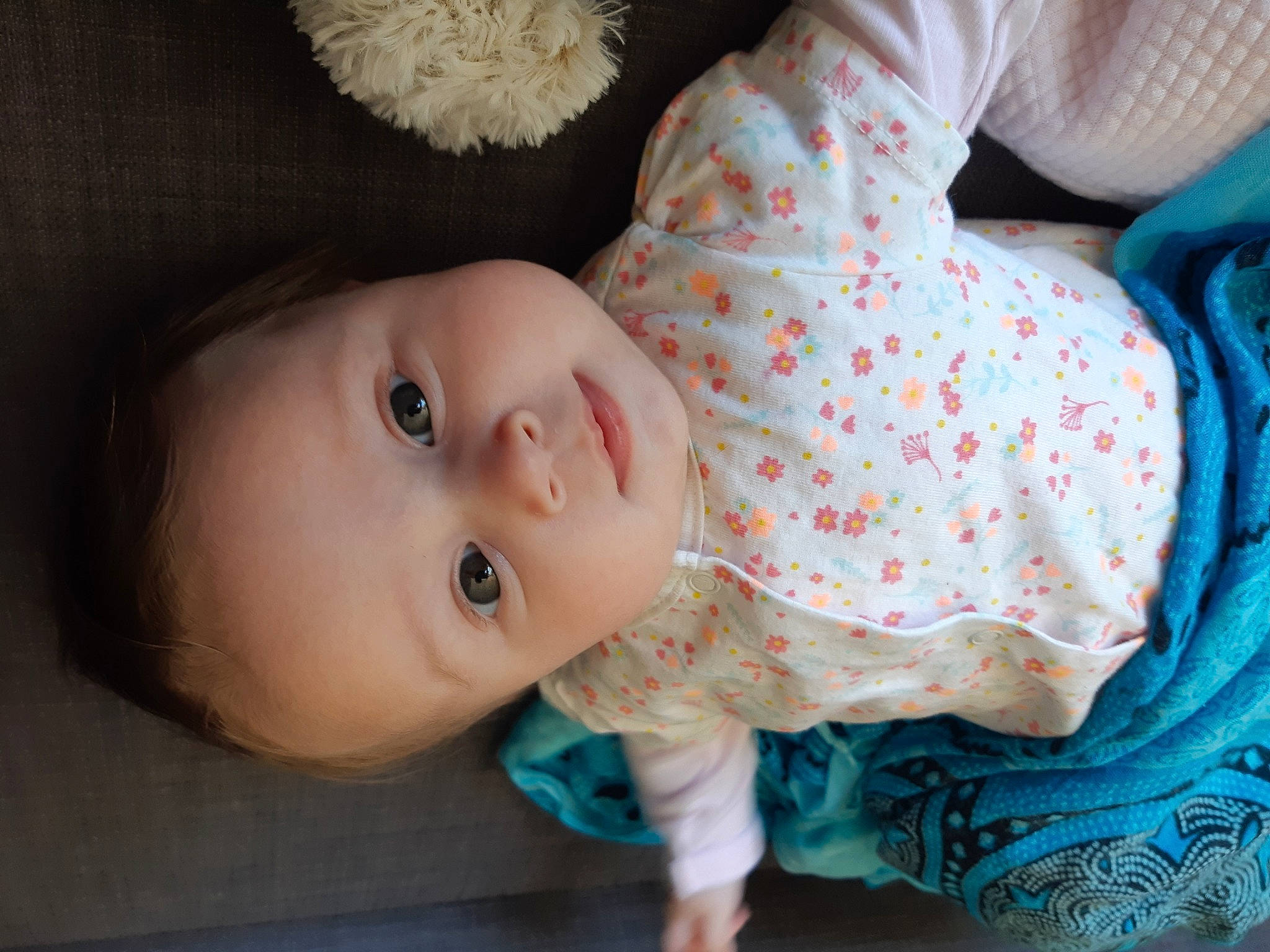 Diane participe au concours pour gagner de l'argent avec cette photo : baby, baby_toddler_clothing, cheek, child, dress, eye, eyelash, face, head, headgear, iris, lip, nose, pattern, person, skin, sleeve, textile, toddler, toy