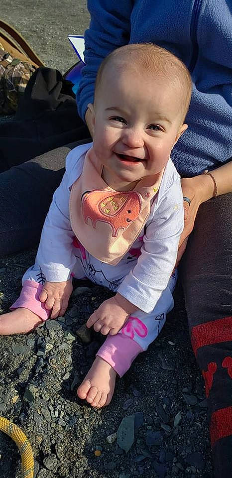 Avalon is registered to the contest to win money with this photo: arm, baby, cheek, child, facial_expression, finger, fun, hand, head, joy, leg, person, plant, play, sitting, smile, toddler, tooth