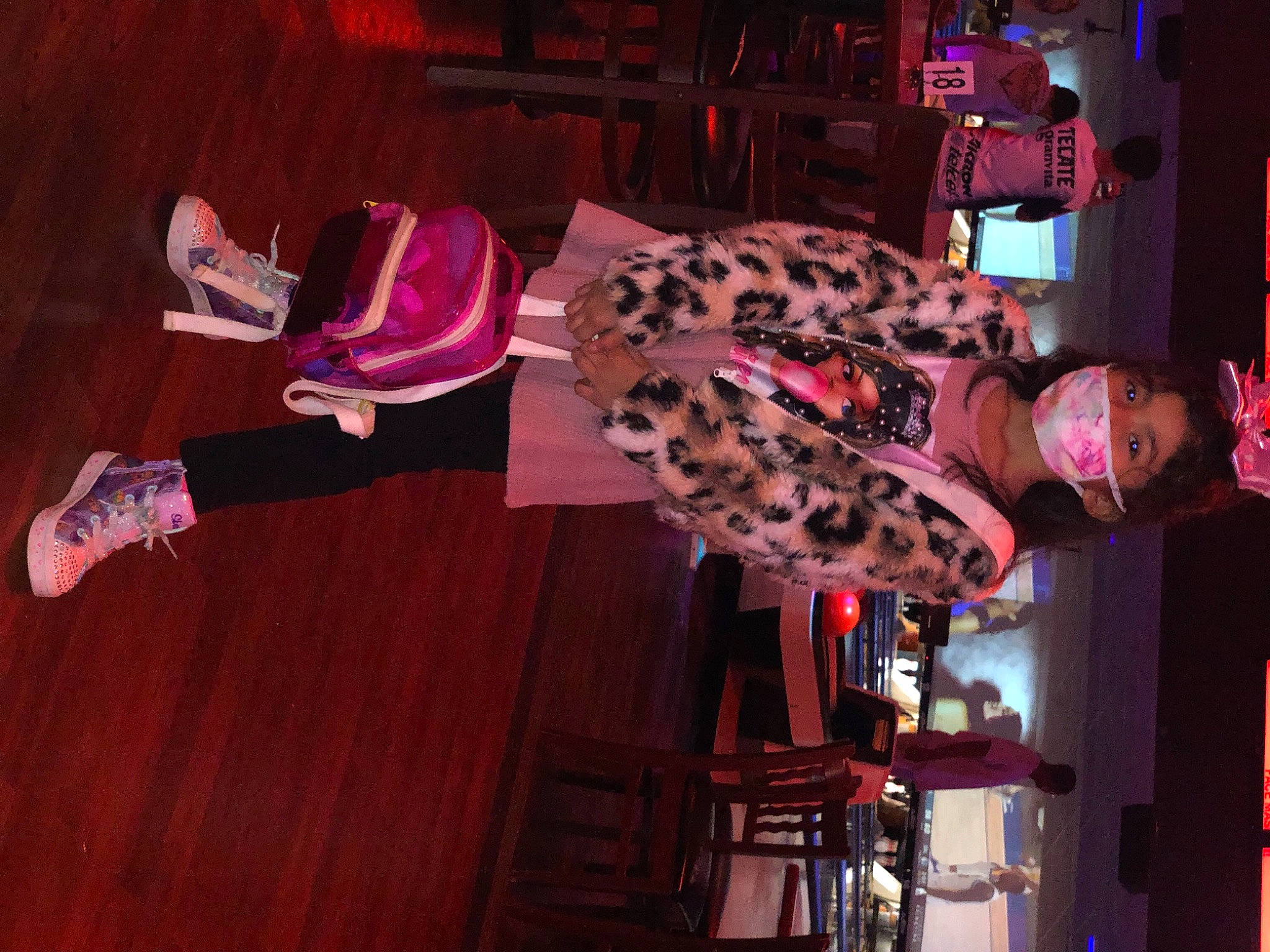 Valerie Ariana is registered to the contest to win money with this photo: entertainment, event, fashion_design, flesh, flooring, fun, hardwood, magenta, performance, performance_art, performing_arts, person, pink, public_event, purple, room, tree, under_exposed, walking_shoe, wood