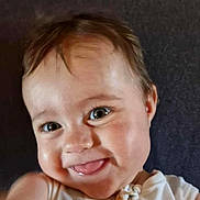 Ambre a rejoint le concours — aidez-le/la à gagner de superbes lots ! baby, child, smiling, tongue, face, eyes, white_clothing, cute, happy, portrait, infant, cheeky, closeup, baby_girl, baby_boy, soft_background, indoor, skin, head, hair