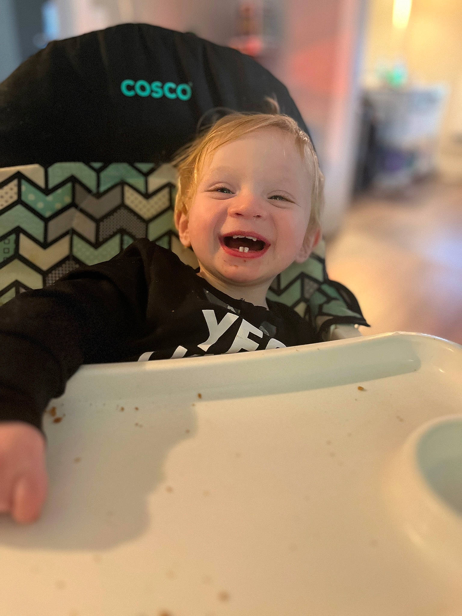 Archer joined the competition — help win amazing prizes! baby, baseball_cap, cap, child, comfort_food, fun, happy, hat, jacket, laugh, logo, person, personal_protective_equipment, play, recreation, room, sitting, sleeve, smile, t_shirt