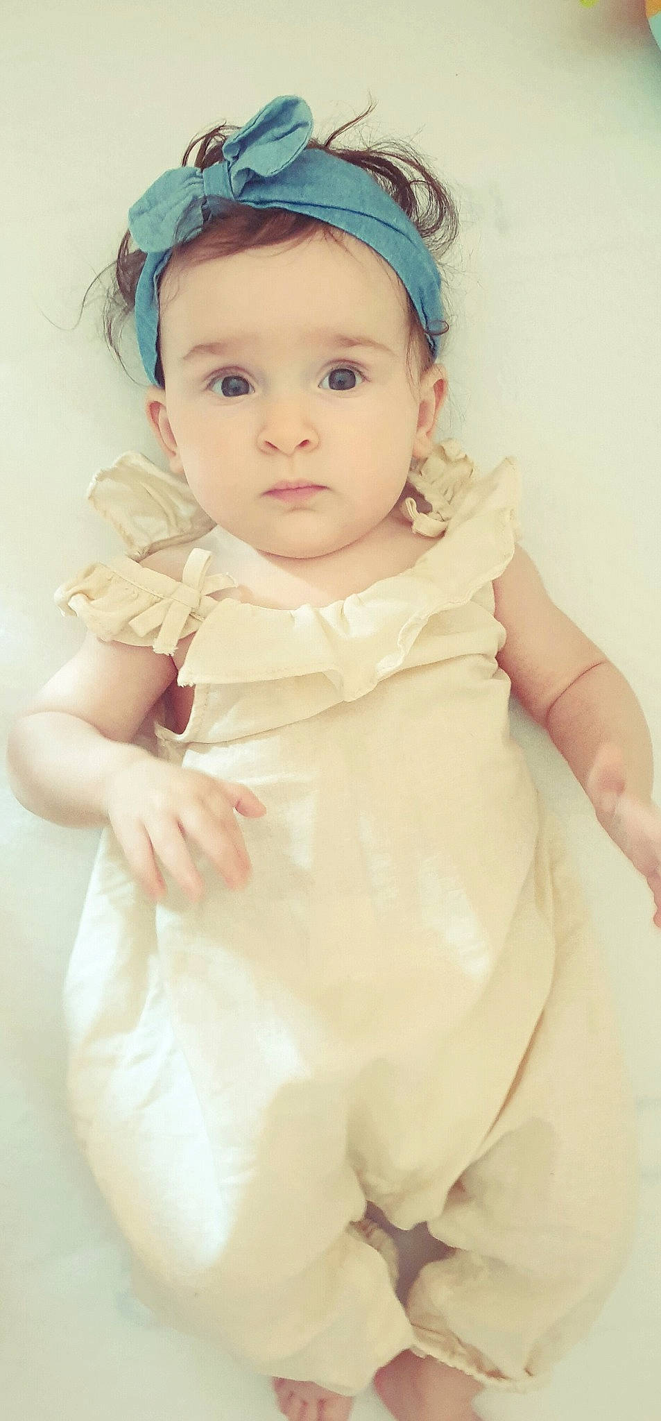 Elena participe au concours pour gagner de l'argent avec cette photo : baby, baby_toddler_clothing, bridal_accessory, cap, cheek, child, day_dress, dress, embellishment, flash_photography, formal_wear, happy, headgear, headpiece, headwear, jewellery, lip, person, pink, skin