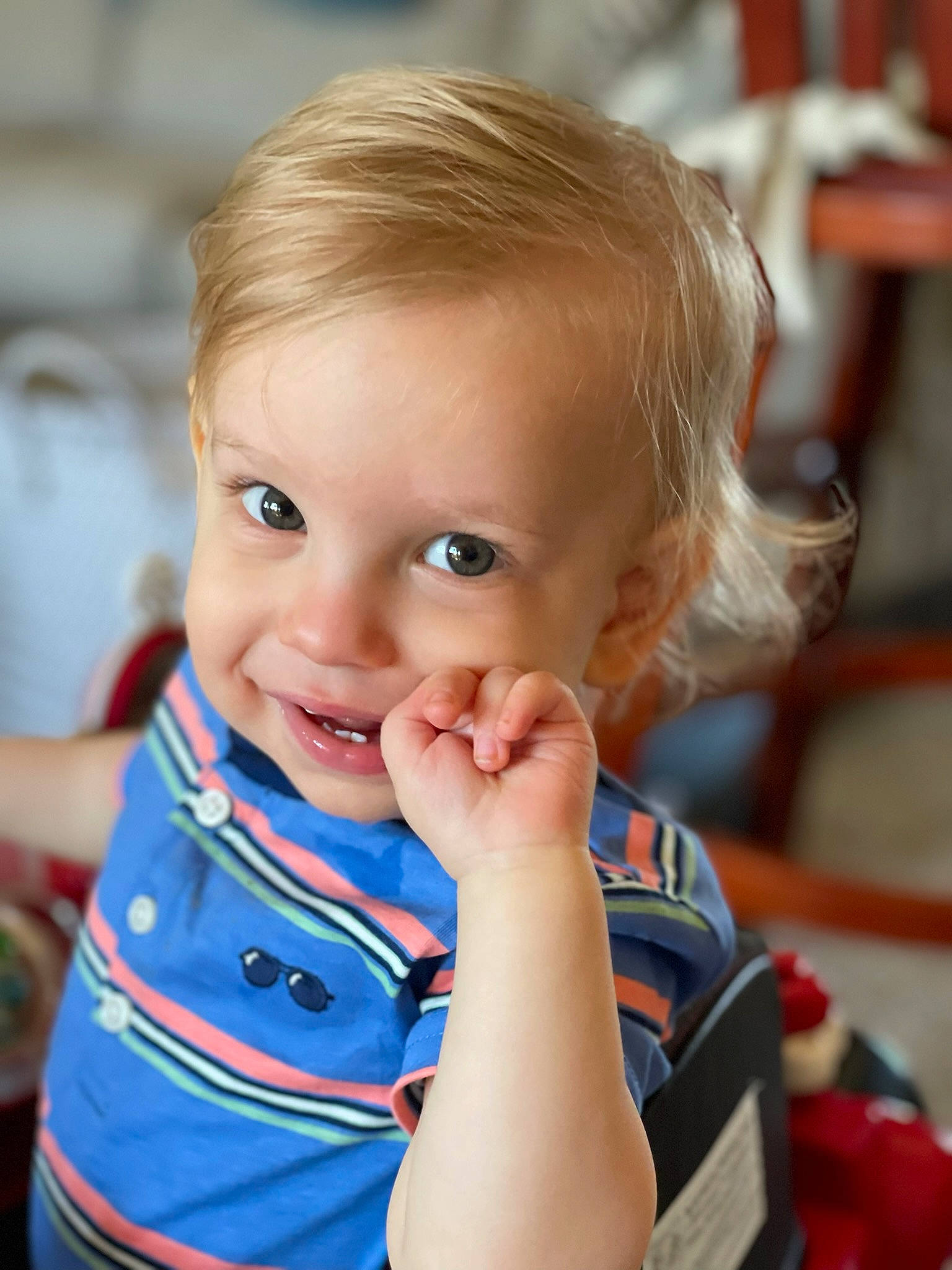 Anthony J. is registered to the contest to win money with this photo: arm, baby_toddler_clothing, cheek, child, chin, eye, eyebrow, face, fun, gesture, hair, hand, happy, head, iris, joy, leisure, nose, person, skin