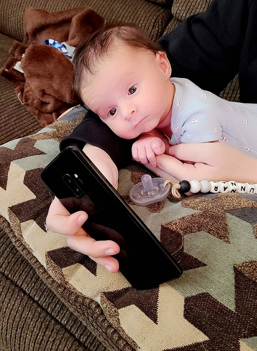 Gunnar joined the competition — help win amazing prizes! baby, baby_toddler_clothing, child, comfort, communication_device, fashion_accessory, finger, flooring, hat, linens, mobile_phone, nail, office_supplies, pattern, person, portable_communications_device, selfie, sleeve, textile, toddler