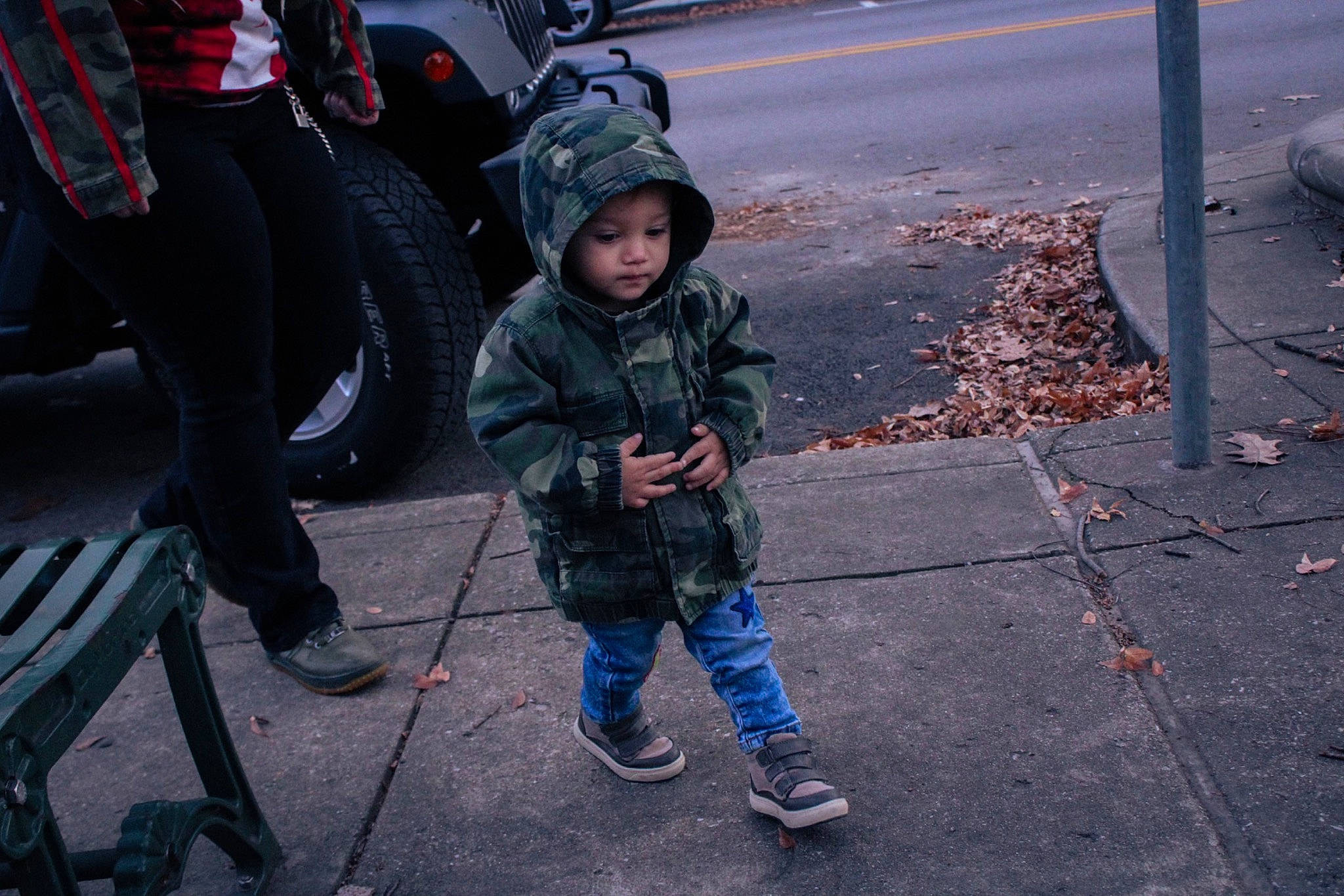 Mortikai is registered to the contest to win money with this photo: asphalt, baby_carriage, backpack, boot, child, city, family_car, headwear, leisure, luggage_and_bags, motor_vehicle, pedestrian, person, recreation, road, road_surface, sidewalk, street, toddler, walking