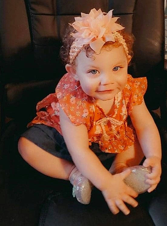 Kora is registered to the contest to win money with this photo: baby_toddler_clothing, bridal_accessory, dress, embellishment, event, eyelash, fashion_design, flash_photography, hand, happy, hat, headgear, headpiece, headwear, iris, jewellery, joy, lip, person, pink