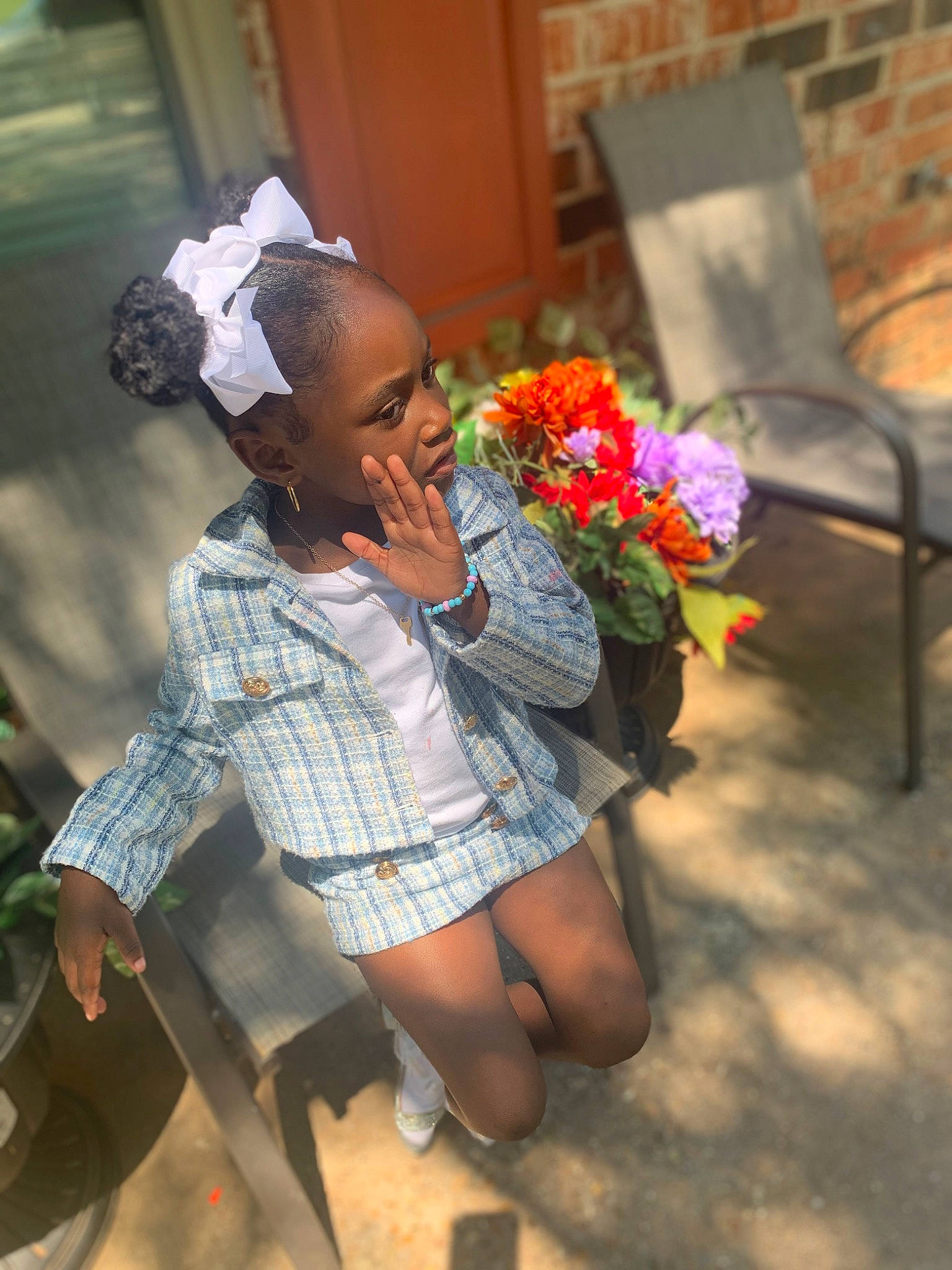 Khalea is registered to the contest to win money with this photo: child, dress, eye, eyewear, facial_expression, flower, fun, hairstyle, happy, hat, human_body, human_leg, leisure, morning, person, petal, plant, sandal, temple, thigh