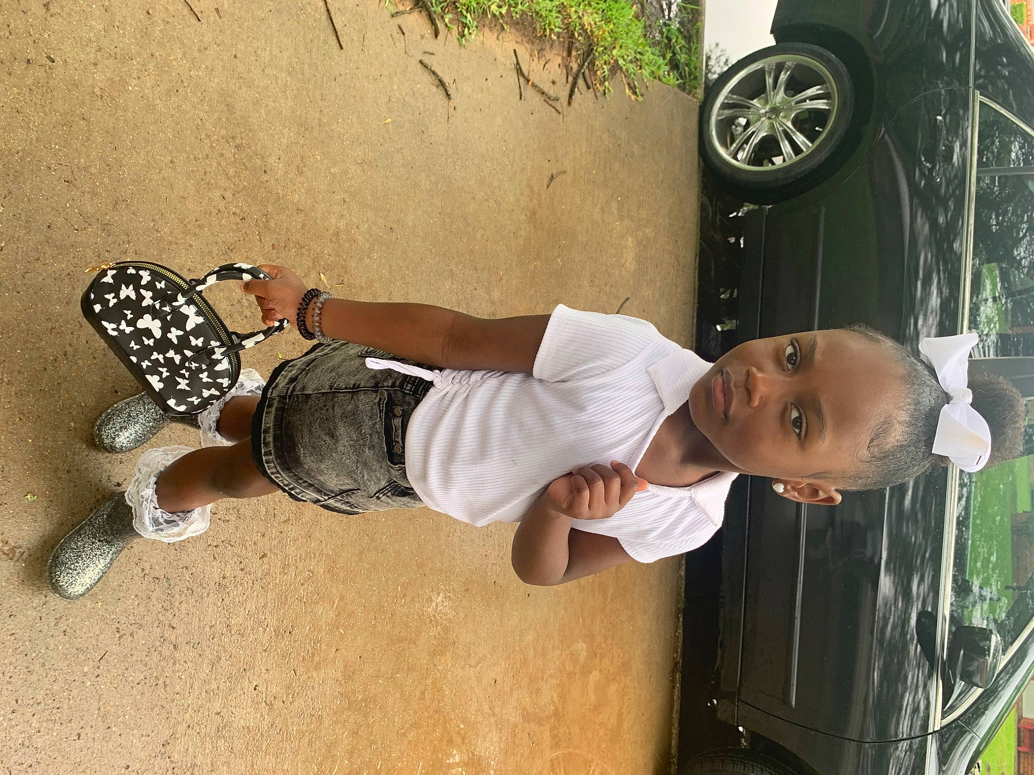 Khalea is registered to the contest to win money with this photo: automotive_exterior, automotive_lighting, automotive_tire, car, cool, elbow, happy, hat, hood, knee, land_vehicle, motor_vehicle, person, shoe, shorts, sneakers, tire, vehicle, vehicle_door, walking_shoe