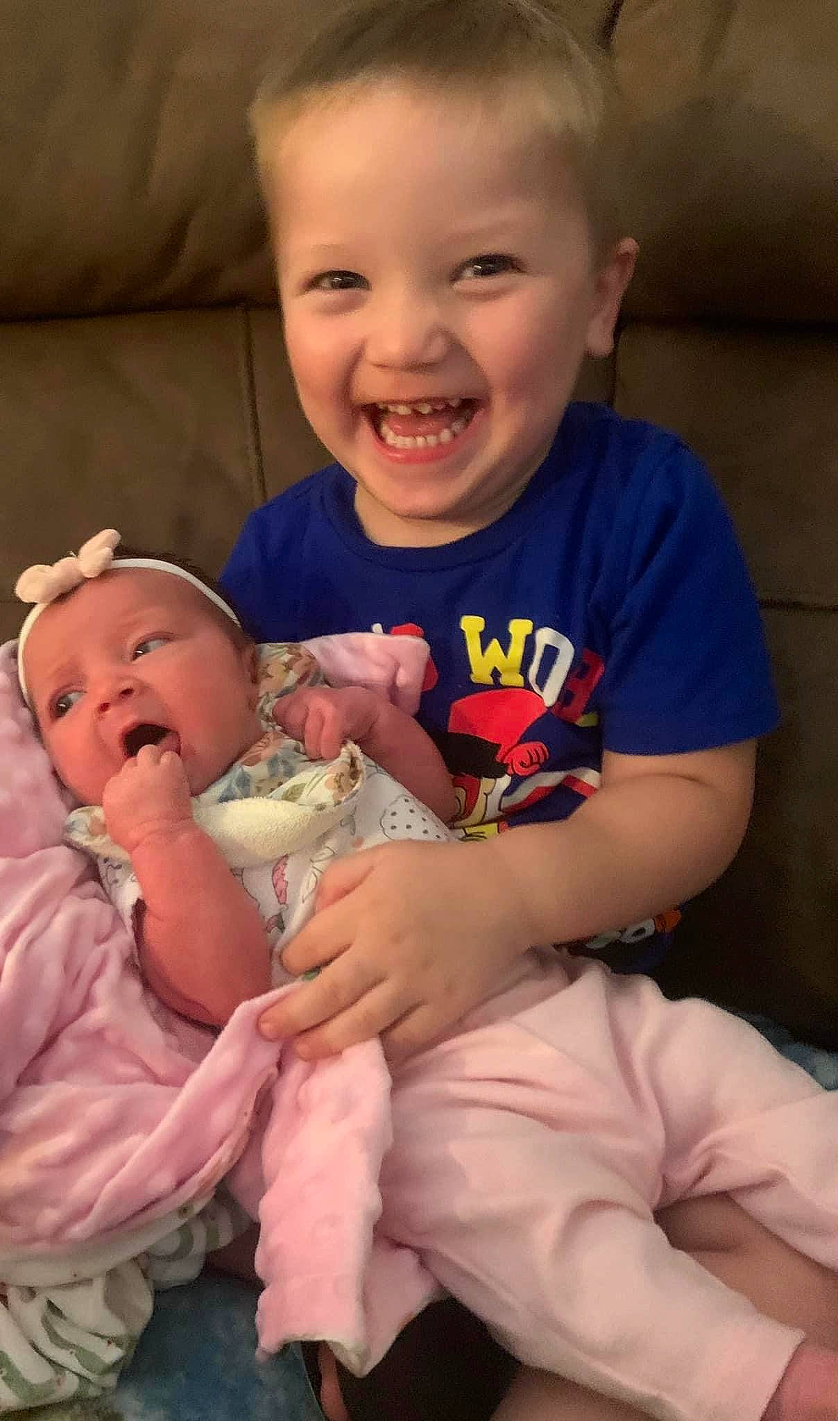 Jarred Scott is registered to the contest to win money with this photo: arm, baby_toddler_clothing, cheek, chin, eye, face, facial_expression, hairstyle, hand, happy, head, human, human_body, iris, joy, mouth, nose, organ, person, skin