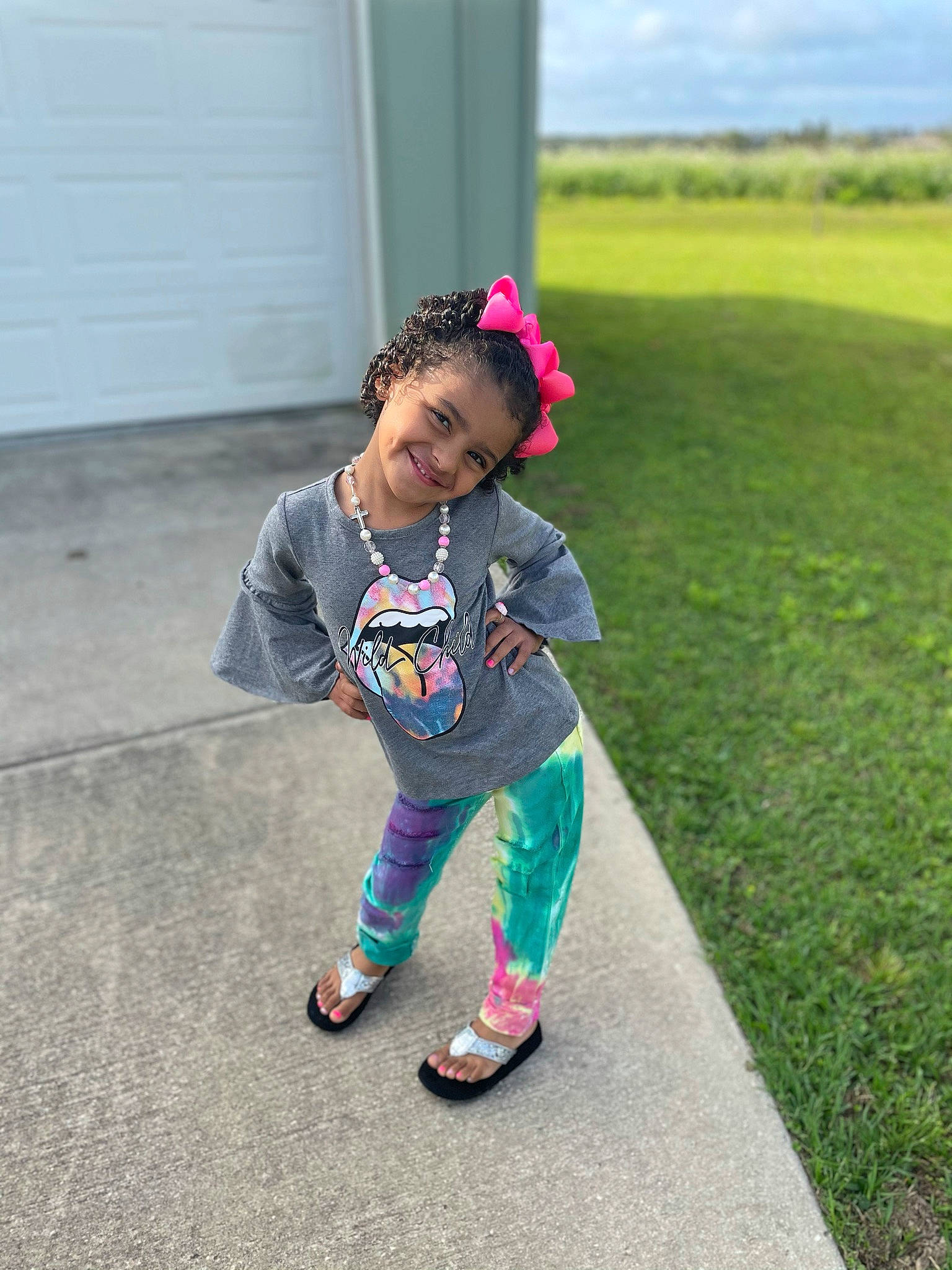 Aubreigh joined the competition — help win amazing prizes! asphalt, baby_toddler_clothing, child, door, electric_blue, fun, grass, grassland, happy, hat, joy, leisure, magenta, person, plant, recreation, sky, smile, t_shirt, toddler