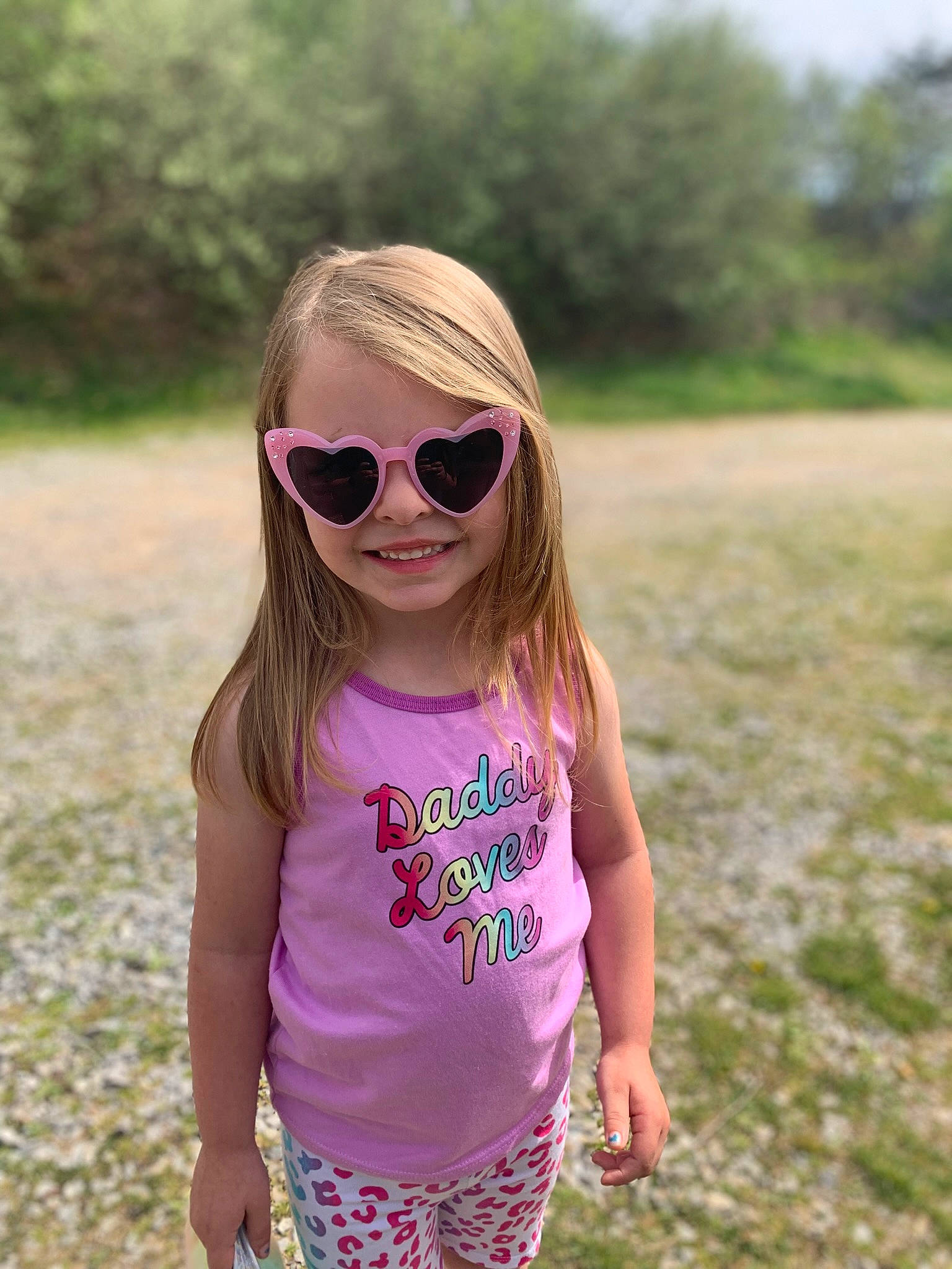 Teagan joined the competition — help win amazing prizes! arm, cool, eyewear, face, glasses, goggles, grass, hair, happy, head, joy, people_in_nature, person, pink, plant, sleeve, smile, street_fashion, sunglasses, sunlight