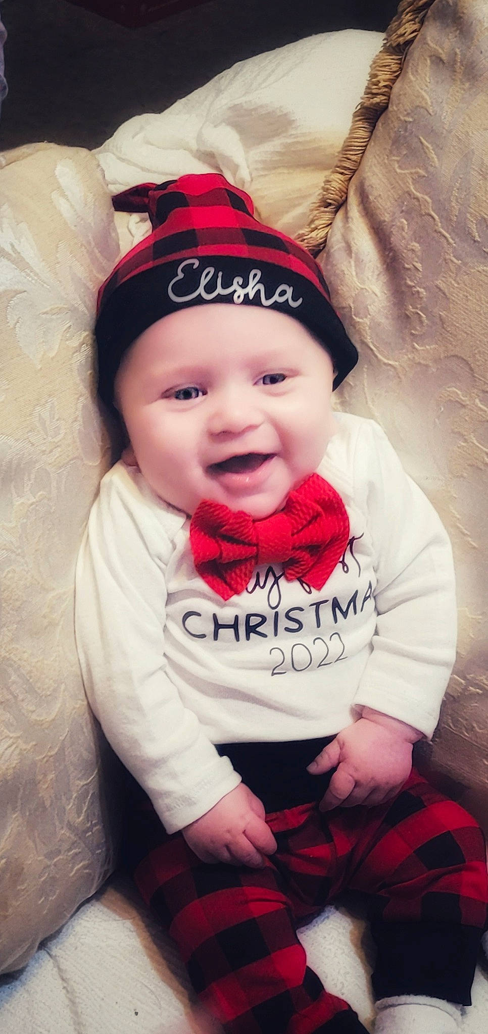 Elisha is registered to the contest to win money with this photo: baby, baby_toddler_clothing, cap, cheek, chin, cool, facial_expression, flash_photography, happy, headgear, headwear, human, human_body, lip, mouth, person, pink, plant, skin, sleeve