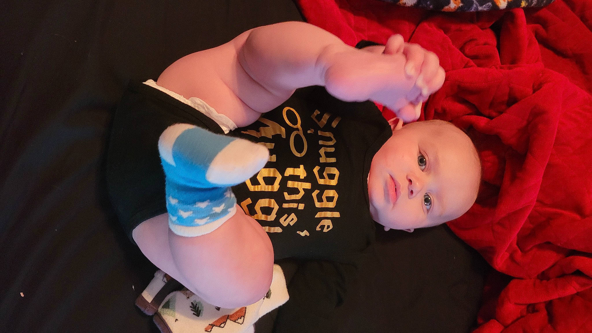 Elisha is registered to the contest to win money with this photo: baby, baby_products, baby_toddler_clothing, child, elbow, event, finger, fun, glove, hand, hat, human_body, human_leg, knee, nail, person, pink, product, thigh, toddler