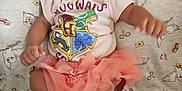L'Eylah joined the competition — help win amazing prizes! baby, blanket, cartoon, child, clothing, curious, cute, expression, face, harry_potter, hogwarts, indoors, infant, lying_down, owl, person, pink, portrait, shirt, tutu