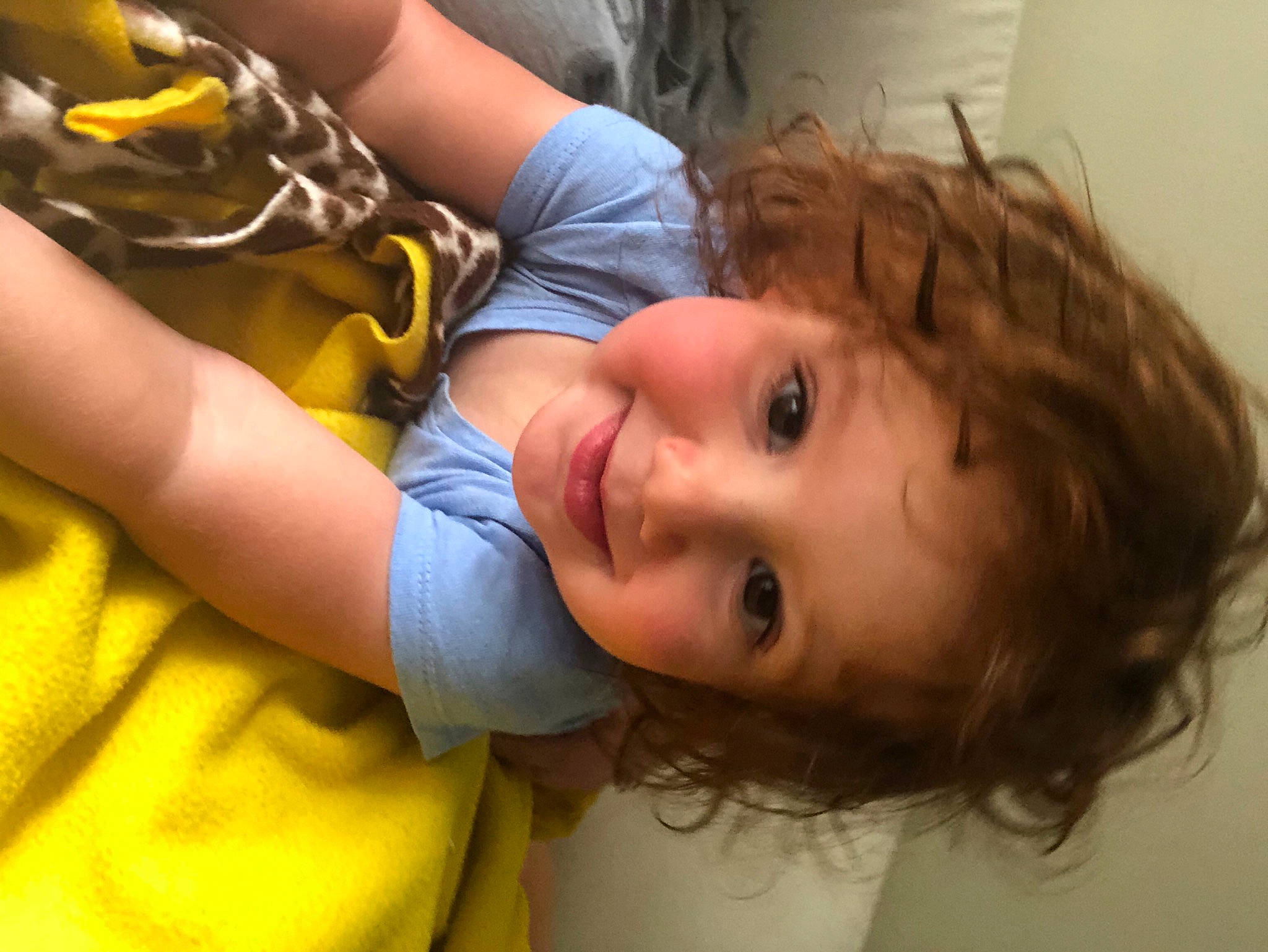 Ellis is registered to the contest to win money with this photo: arm, cheek, eyelash, facial_expression, fun, grass, happy, hat, human_body, iris, joint, joy, leisure, lip, mouth, nose, person, skin, smile, summer