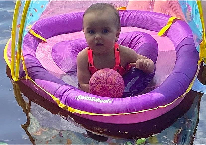 Ariana Elizabeth-rose is registered to the contest to win money with this photo: baby, baby_products, baby_toddler_clothing, circle, comfort, fun, games, grass, happy, head, inflatable, leisure, magenta, people_in_nature, person, play, product, purple, recreation, toddler