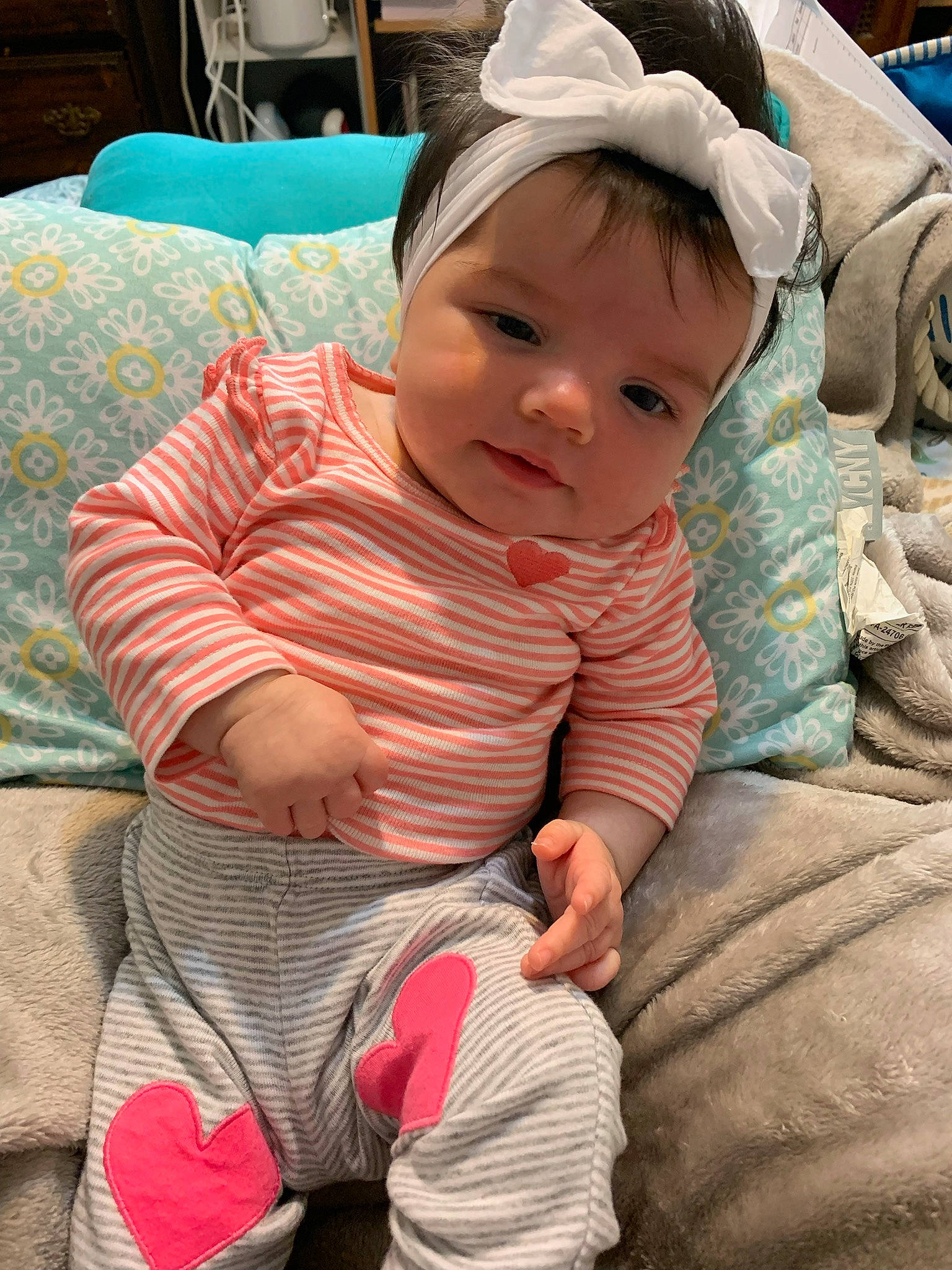 Jazlynn joined the competition — help win amazing prizes! baby, baby_toddler_clothing, baseball_cap, cap, cheek, child, comfort, eye, face, fashion_accessory, fun, grass, happy, headwear, human_body, lap, person, sitting, skin, sleeve