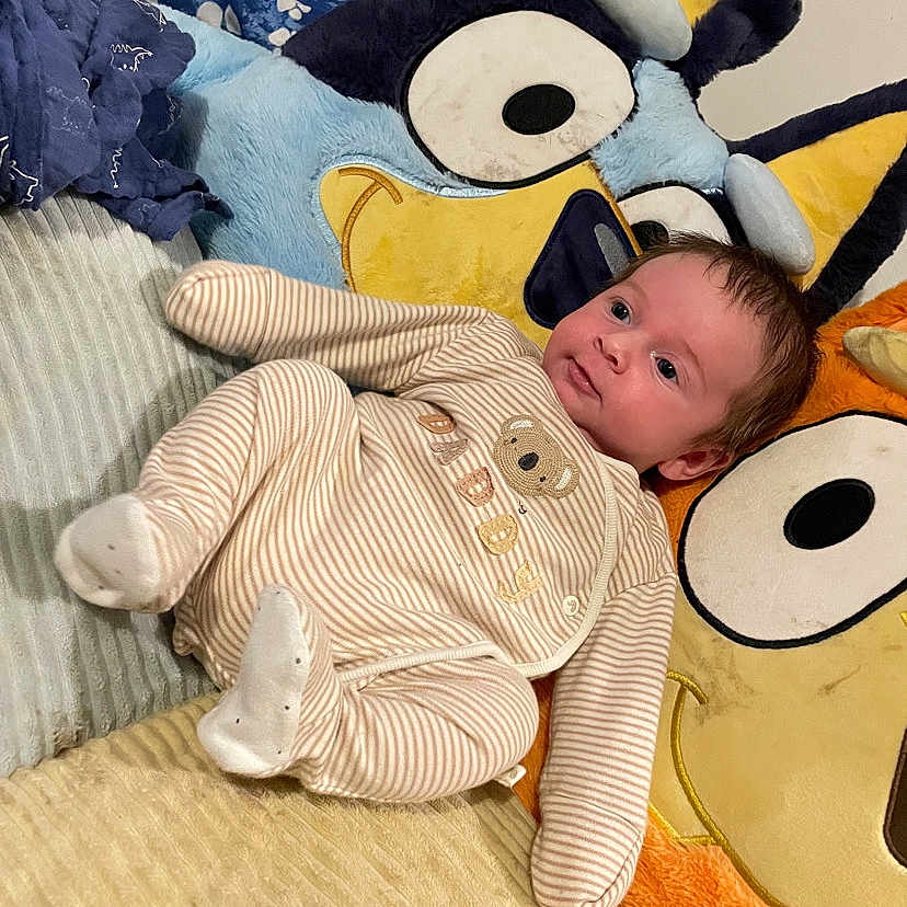 Xavier-James joined the competition — help win amazing prizes! baby, cartoon_pillow, child, colorful, comfort, couch, cozy, cute, home, indoor, infant, koala_design, pajamas, person, plush_pillow, relaxed, smiling, sofa, soft_toys, striped_clothing