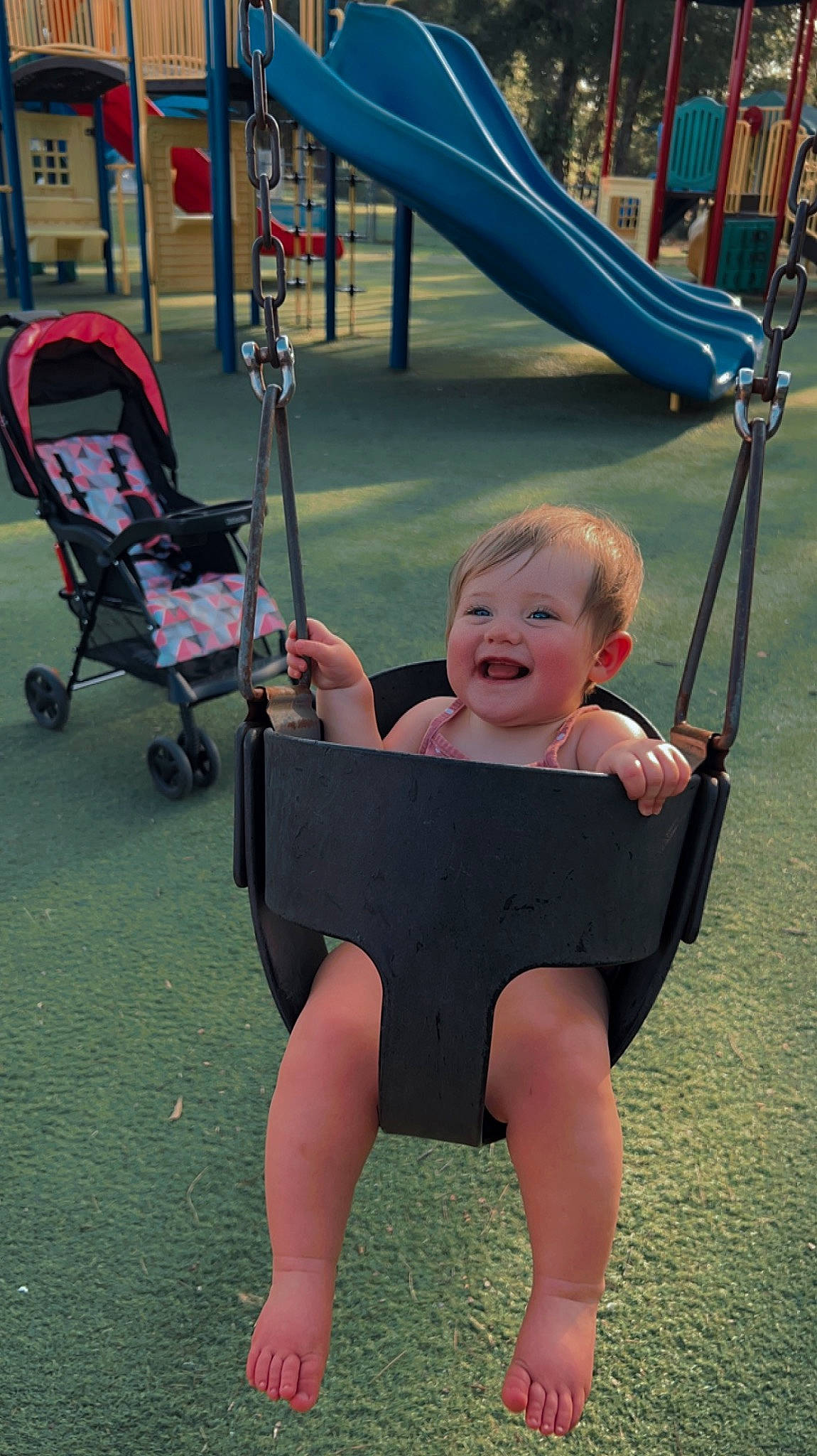 Avrianna is registered to the contest to win money with this photo: baby, blue, city, eye, fun, grass, hair, happy, human_body, human_settlement, joy, knee, leisure, person, photograph, playground, skin, smile, snapshot, thigh