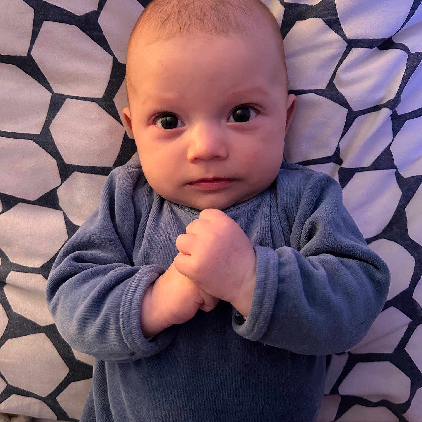 Ethan participe au concours pour gagner de l'argent avec cette photo : baby, biting, blanket, blonde, bodypart, clothing, face, finger, hair, hand, happy, head, newborn, person, photography, portrait, sitting, sleeve, smile