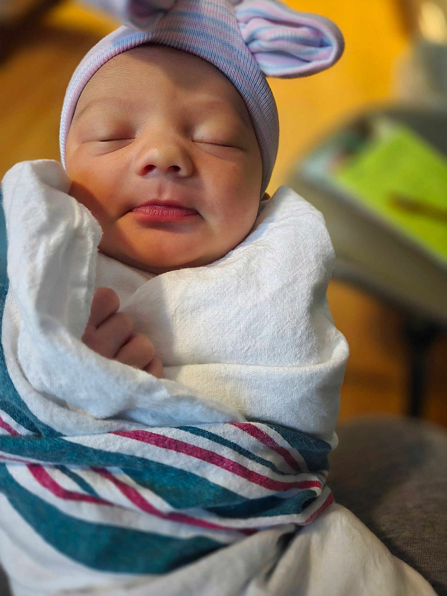 Jazlin joined the competition — help win amazing prizes! newborn, baby, sleeping, blanket, hat, bunny_ears, wrapped, cozy, soft_light, closeup, infant, peaceful, cute, indoors, person, child, face, mouth, nose, hand