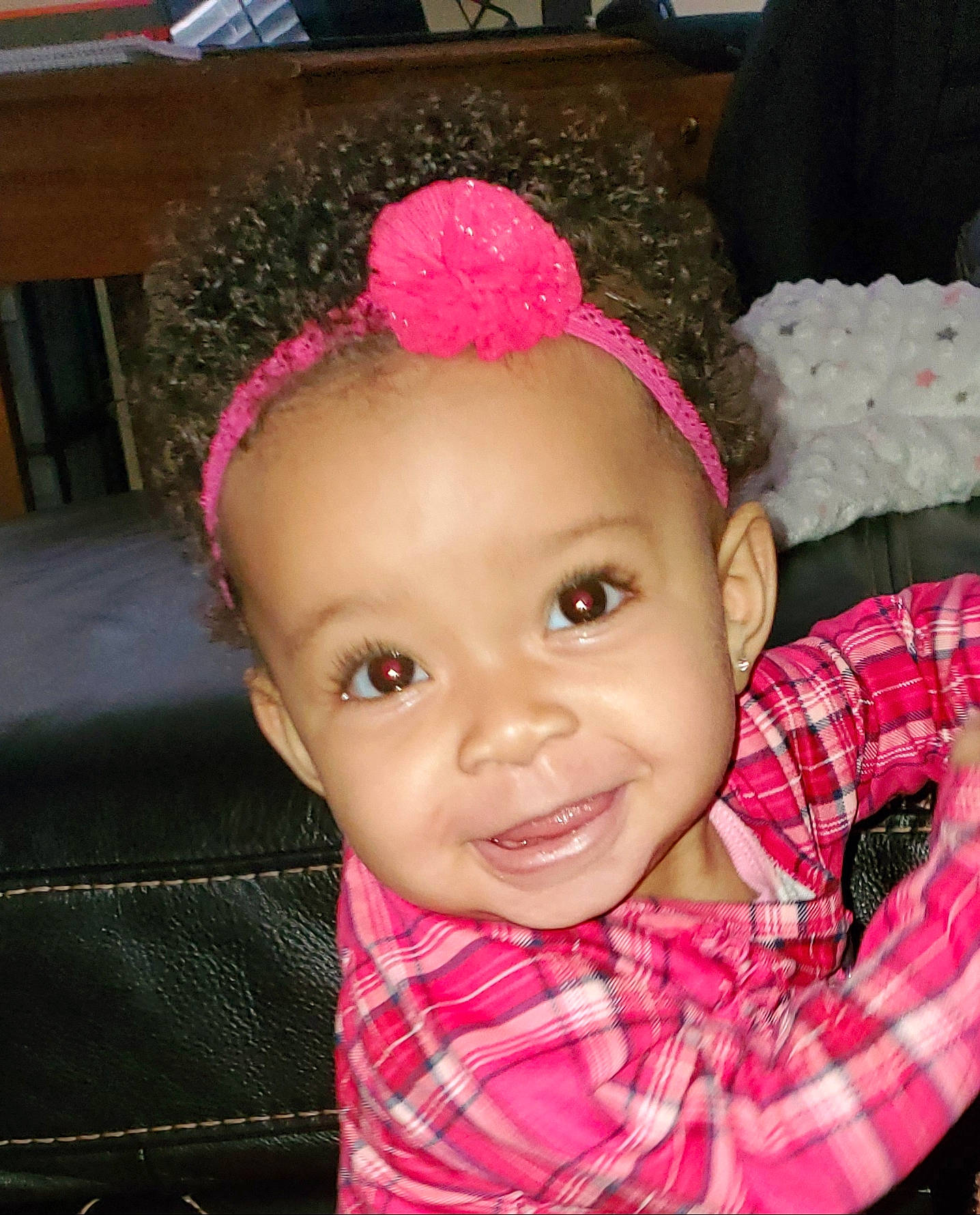 Brentlye is registered to the contest to win money with this photo: baby, cheek, child, face, fashion_accessory, forehead, hair_accessory, head, headband, headgear, joy, lip, person, pink, skin, smile, toddler