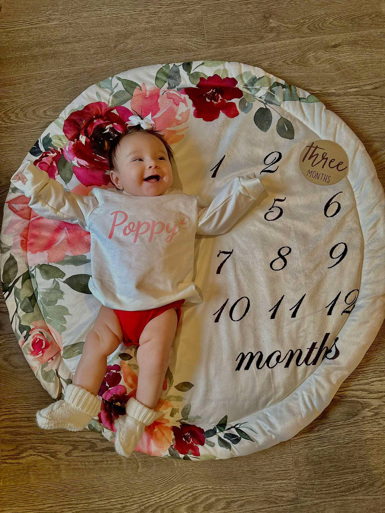 Penelope joined the competition — help win amazing prizes! baby, baby_products, baby_toddler_clothing, child, cut_flowers, event, fashion_accessory, font, hair_accessory, happy, head, joy, linens, magenta, pattern, peach, person, petal, sitting, sleeve