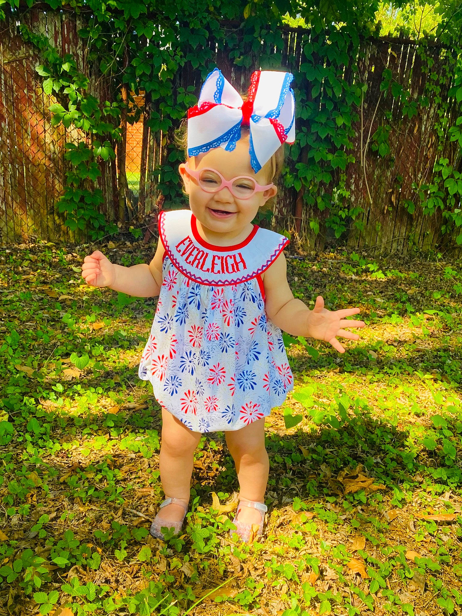 Everleigh is registered to the contest to win money with this photo: baby, baby_toddler_clothing, botany, child, electric_blue, fun, garden, grass, groundcover, happy, headgear, headwear, lawn, meadow, party_supply, pattern, people_in_nature, person, plant, smile