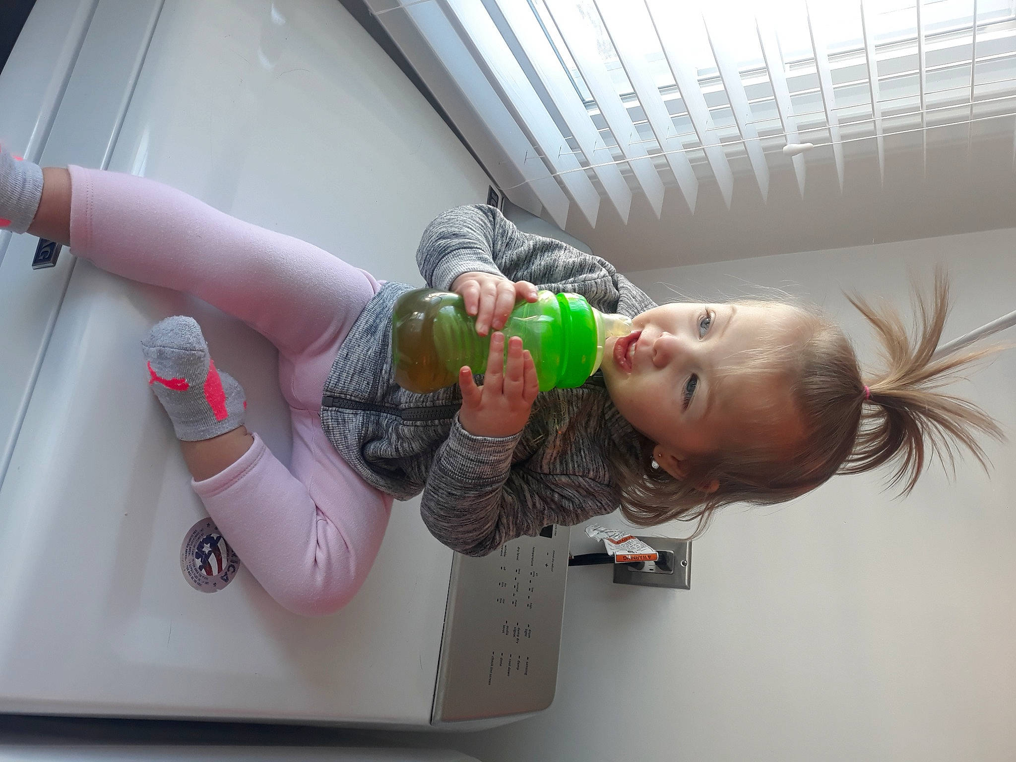 Helena joined the competition — help win amazing prizes! arm, baby, baby_products, bottle, child, drinkware, fun, hand, health_care, human_leg, machine, person, plastic, plastic_bottle, room, sock, toddler, water_bottle, wrist