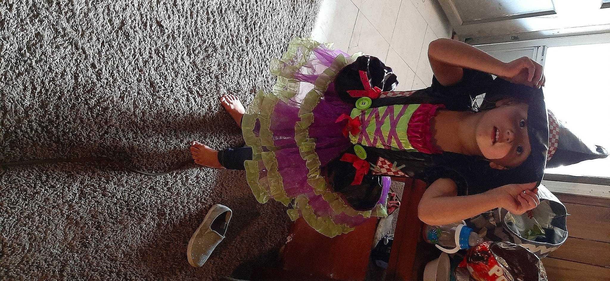 Addison joined the competition — help win amazing prizes! arm, child, costume, event, fashion_design, flooring, fun, headwear, leisure, magenta, pattern, person, pink, purple, room, sandal, shorts, textile, thigh, tradition