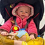 Kamélia participe au concours pour gagner de l'argent avec cette photo : baby, baby_accessory, blanket, car_seat, child, closeup, clothing, cute, floor_tiles, happy, hooded_jacket, indoor, infant, person, playing, portrait, seat_belt, smiling, toy, warm