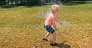 Braxton joined the competition — help win amazing prizes! automotive_design, automotive_exterior, automotive_wheel_system, bicycle_handlebar, bicycle_part, bicycles_equipment_and_supplies, grass, landscape, lawn, leisure, motor_vehicle, people_in_nature, personal_protective_equipment, plant, recreation, sitting, toddler, tree, vehicle, yellow