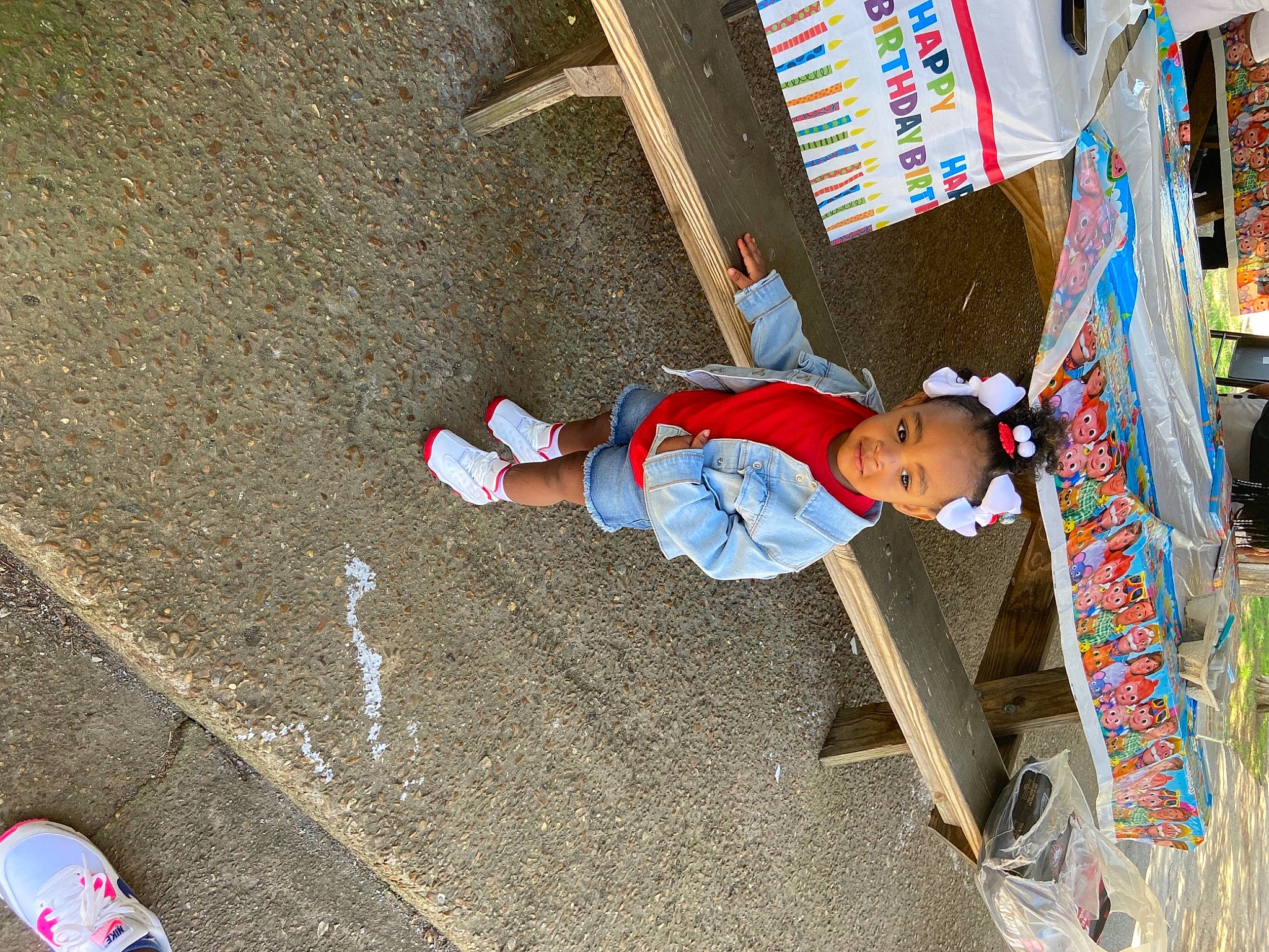 Ava joined the competition — help win amazing prizes! asphalt, baby, carmine, child, city, concrete, fun, hat, human_leg, leisure, person, play, public_space, red, road_surface, sidewalk, sneakers, toddler, travel, walking_shoe