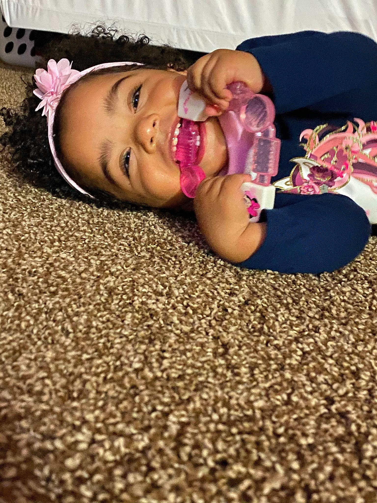 Esperanza is registered to the contest to win money with this photo: beauty, child, cool, eyewear, facial_expression, flash_photography, flooring, fun, grass, happy, headwear, human, human_leg, lip, magenta, mammal, mouth, person, pink, smile