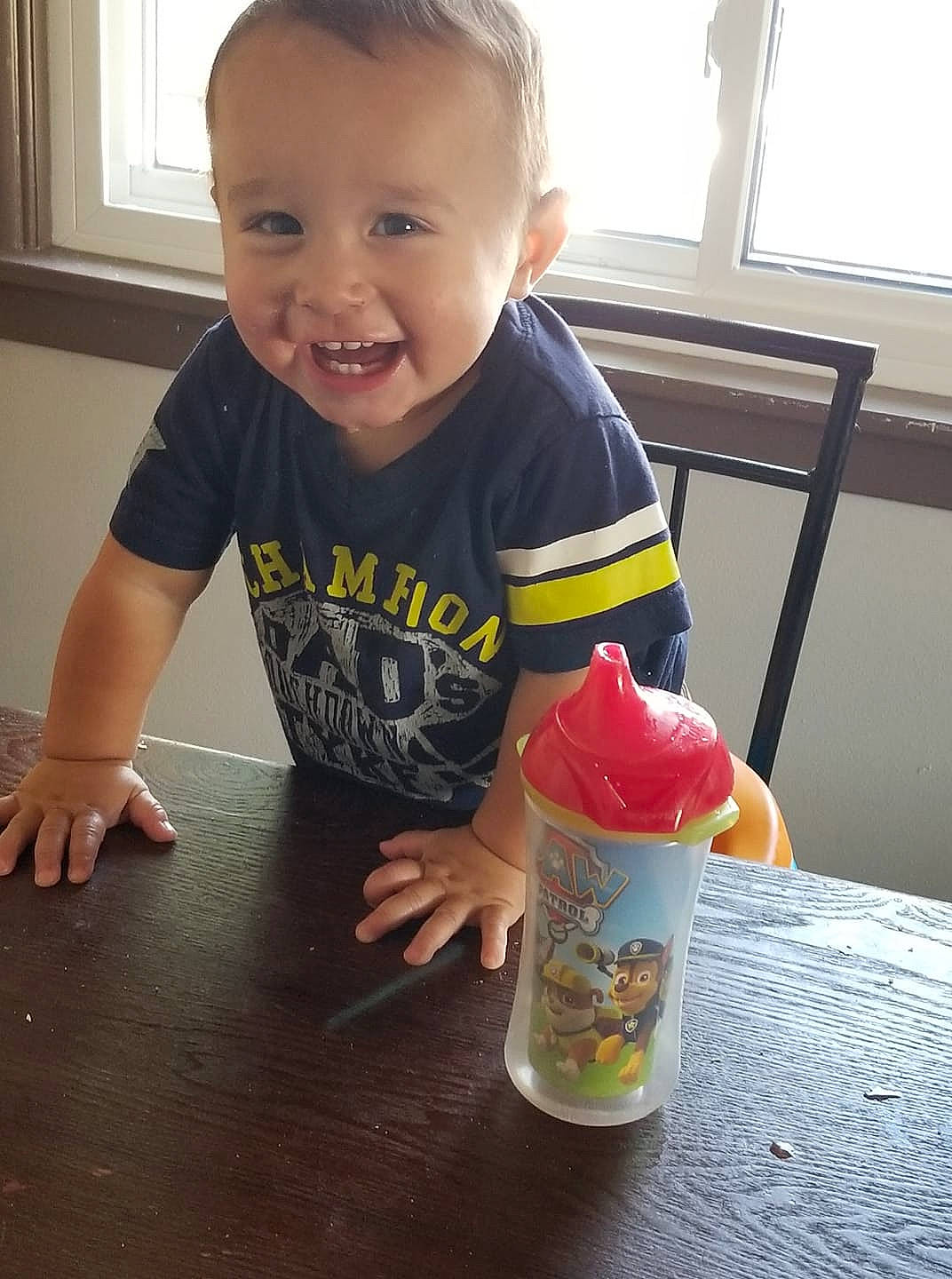Brendon is registered to the contest to win money with this photo: child, day, drinkware, eating, fun, infant, joy, person, plastic_bottle, play, product, toddler