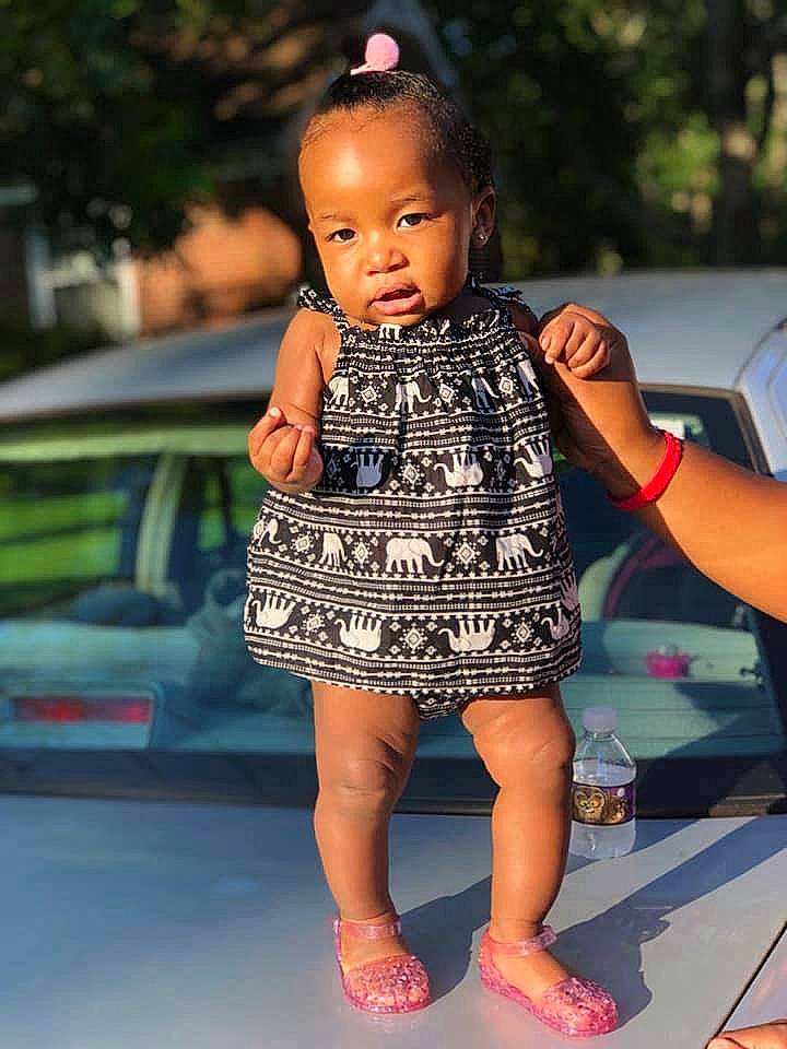 Amyah is registered to the contest to win money with this photo: child, child_model, fashion, fashion_model, flooring, footwear, fun, girl, joint, leg, person, product, shoe, shoulder, smile, toddler