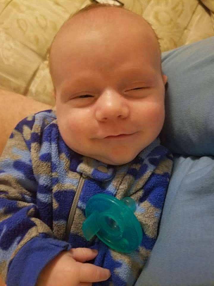 Jason is registered to the contest to win money with this photo: baby, cheek, child, eye, face, finger, forehead, head, lip, mouth, nose, person, play, skin, smile, thumb, toddler