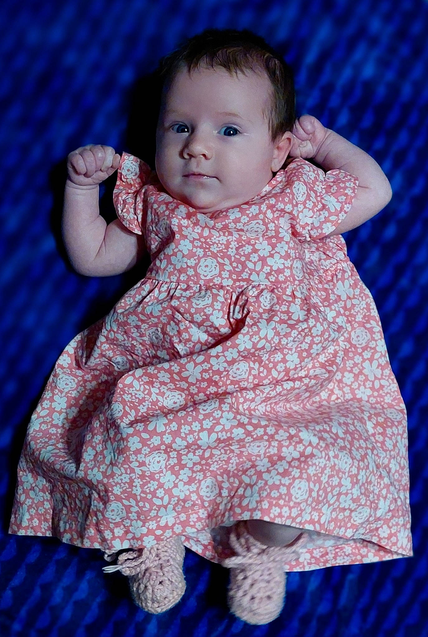 Emmalynn is registered to the contest to win money with this photo: baby, baby_toddler_clothing, blue, cheek, child, collar, dress, electric_blue, finger, flash_photography, hand, happy, lip, magenta, pattern, person, pink, purple, skin, sleeve