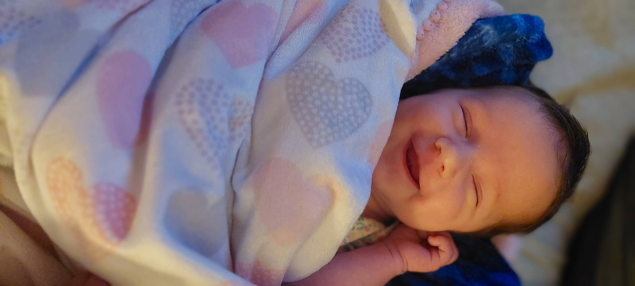 Emmalynn is registered to the contest to win money with this photo: baby, close_up, comfort, electric_blue, eyebrow, eyelash, finger, gesture, hand, happy, headgear, human_body, iris, lip, mouth, nose, person, skin, sunglasses, thumb