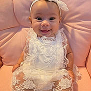 Willow joined the competition — help win amazing prizes! adorable, baby, baby_fashion, child, cushion, cute, fashion, happy, headband, indoors, infant, lace, person, pink_chair, portrait, sitting, smiling, soft_lighting, white_dress, young_child