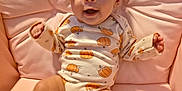 Willow joined the competition — help win amazing prizes! baby, child, infant, pink_bow, pumpkin_pattern, onesie, cushion, pink, smiling, happy, cute, sitting, face, headband, indoors, soft, plush, apparel, portrait, young