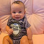 Willow joined the competition — help win amazing prizes! baby, infant, smile, onesie, clothing, pink, cushion, chair, cute, portrait, child, sitting, happy, face, skin, indoor, young, person, apparel, expression