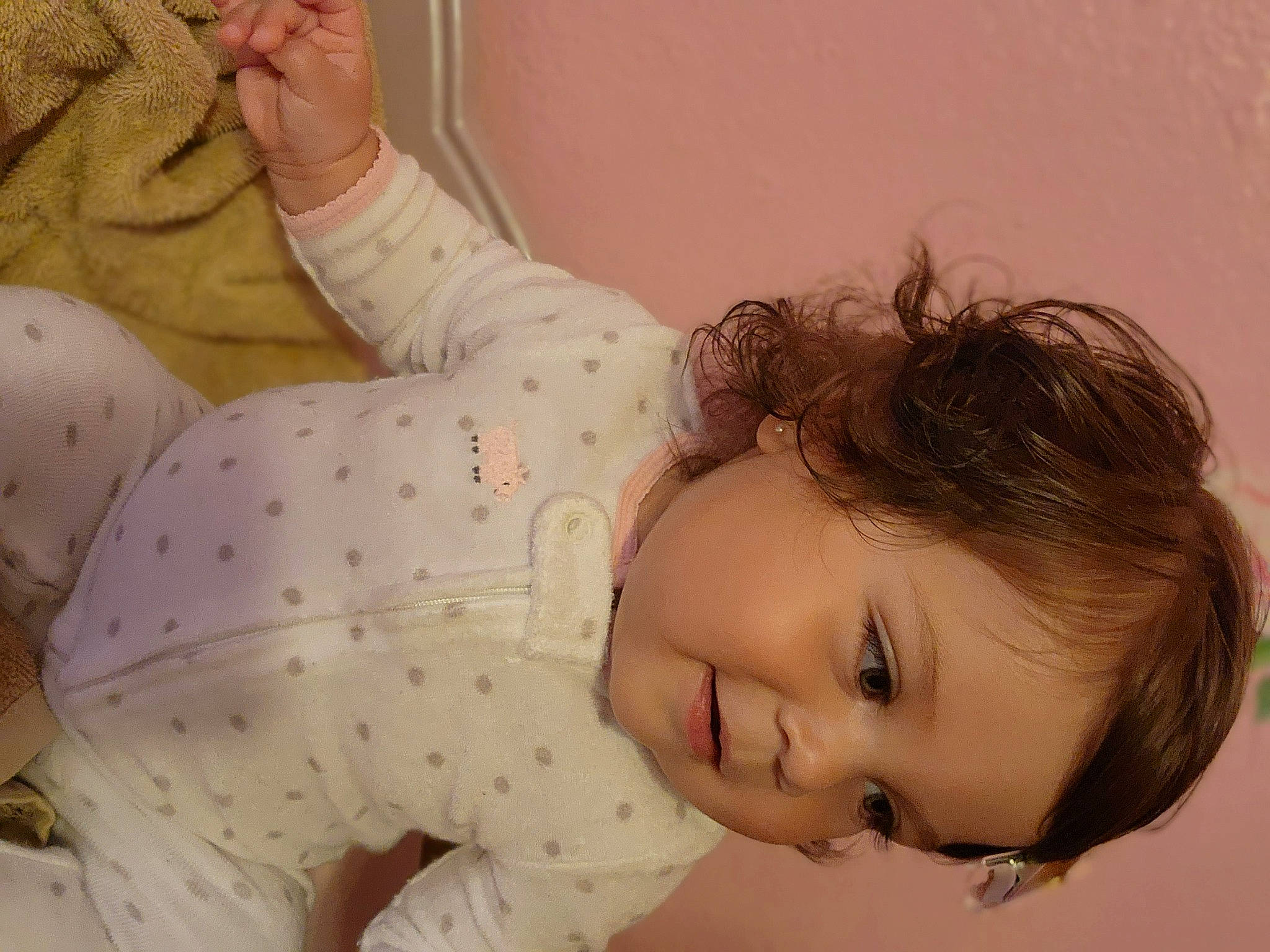 Nalani is registered to the contest to win money with this photo: arm, baby_toddler_clothing, child, comfort, eye, eyelash, facial_expression, hand, happy, joint, linens, lip, mammal, mouth, neck, nose, person, skin, sleeve, smile