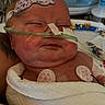 Carter joined the competition — help win amazing prizes! newborn, baby, infant, hospital, medical, oxygen_tube, monitoring_patches, blanket, sleeping, face, head, patient, healthcare, nasal_cannula, wrapped, bed, closeup, child, person, resting