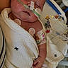 Carter joined the competition — help win amazing prizes! baby, infant, hospital, medical_tubes, blanket, sleeping, face, monitoring, patient, healthcare, child, bed, resting, medical_equipment, hospital_bed, person, cute, newborn, wrapped, tubes