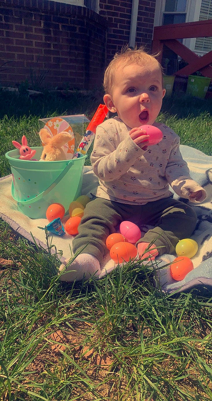 Giselle joined the competition — help win amazing prizes! baby, child, eye, facial_expression, fun, grass, green, happy, head, leaf, leg, orange, people, people_in_nature, person, photograph, plant, snapshot, surprise, toddler