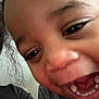child, close_up, smiling, happy, teeth, face, joy, person, emotion, expression, black_hair, indoor, skin, eye, mouth, cheek, casual_clothing, fun, young, portrait