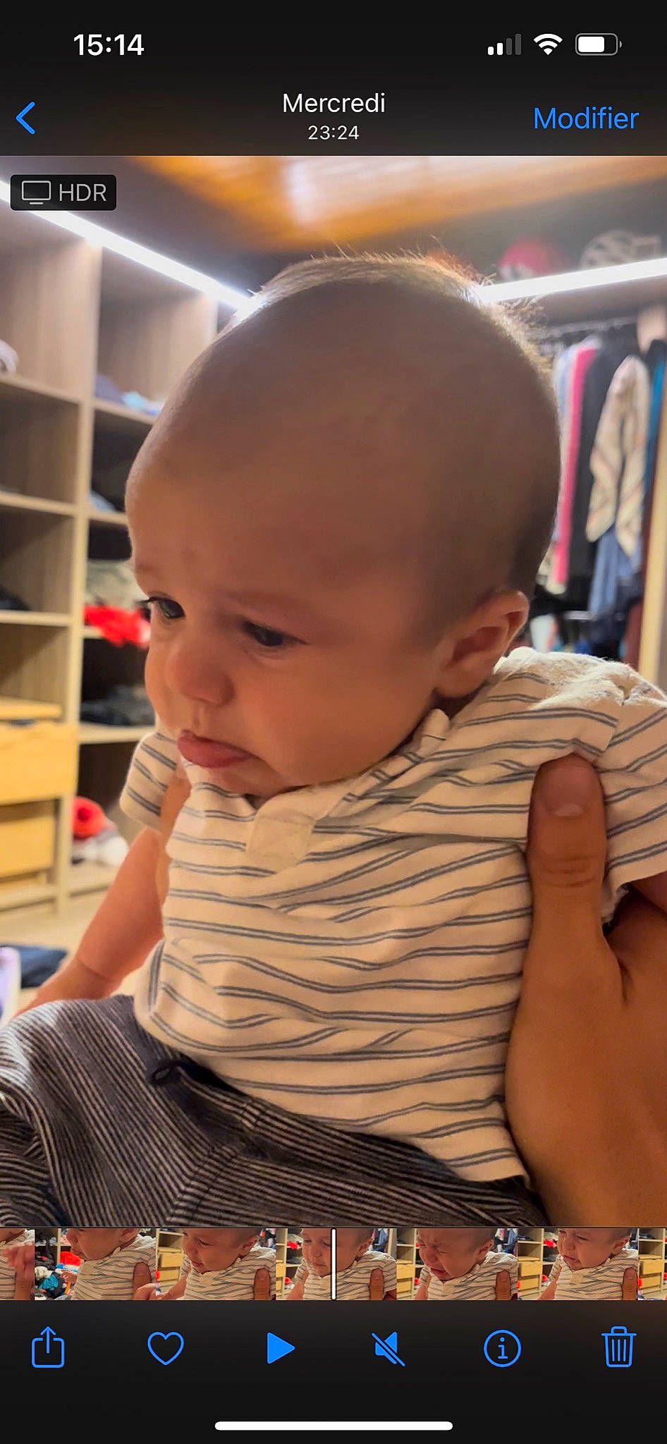 Hector participe au concours pour gagner de l'argent avec cette photo : arm, baby, baby_toddler_clothing, cheek, child, chin, comfort, elbow, finger, flooring, mouth, neck, nose, person, shelf, sitting, skin, sleeve, thumb, toddler