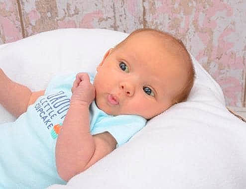 Gemma is registered to the contest to win money with this photo: baby, cheek, child, chin, ear, eye, face, forehead, lip, mouth, nose, person, pink, product, skin, textile, toddler