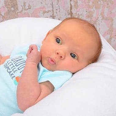 Gemma is registered to the contest to win money with this photo: baby, cheek, child, chin, ear, eye, face, forehead, lip, mouth, nose, person, pink, product, skin, textile, toddler